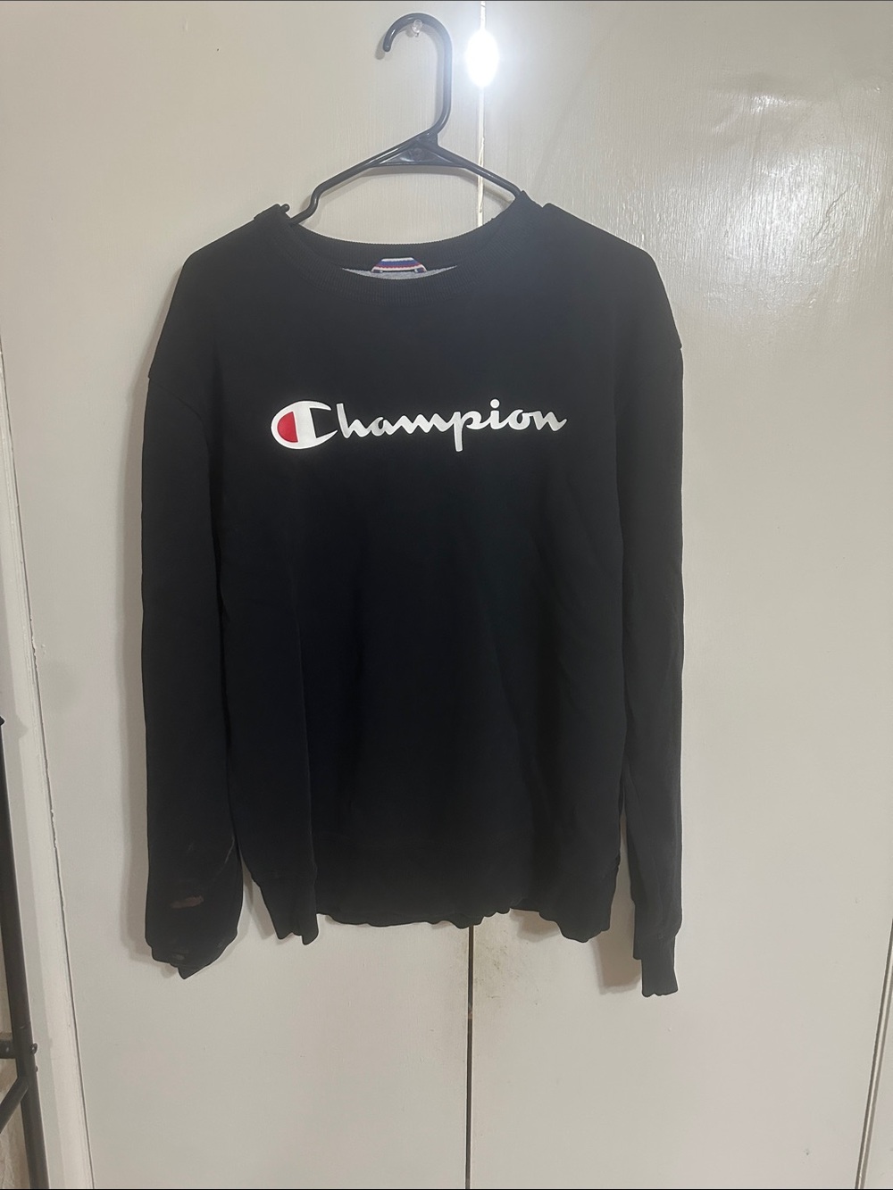 Champion Black Crewneck Sweatshirt with White Script Logo and Red Accent